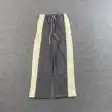 Contrast-panel pants — photo 1